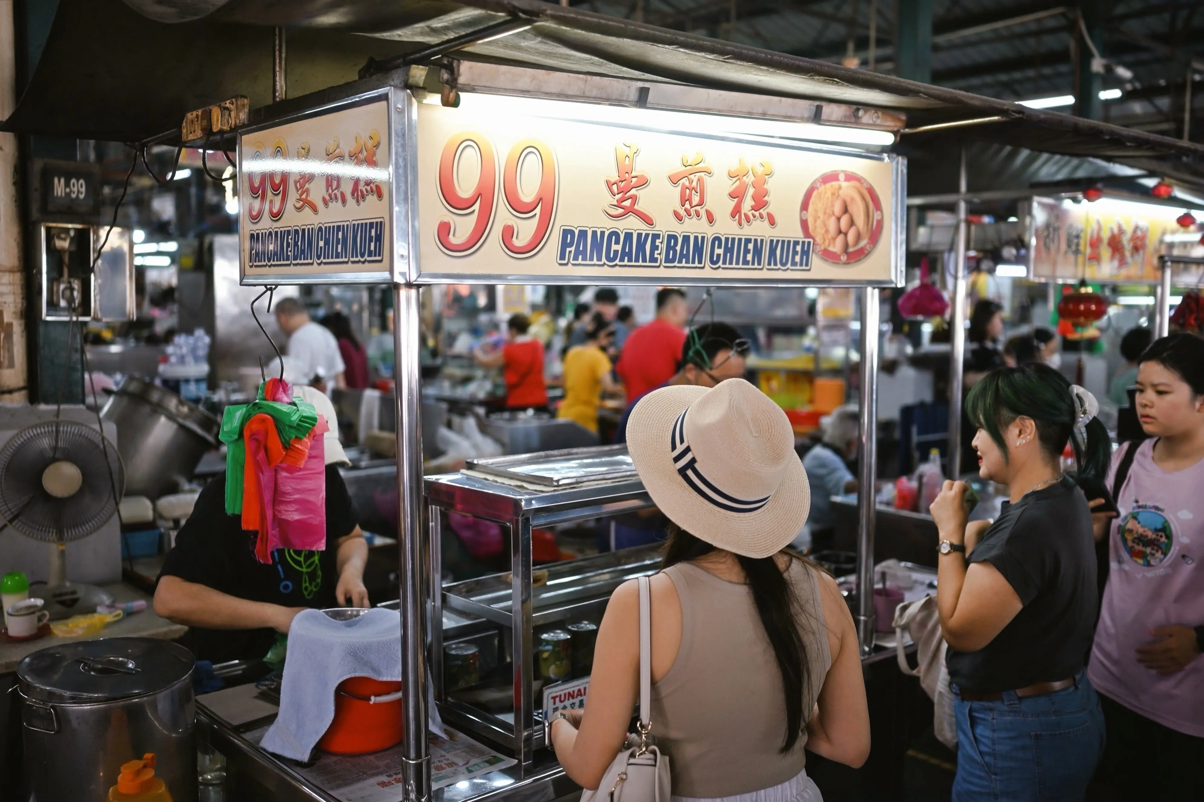 What Does Nyonya Cuisine Symbolize in Malaysian Culture?